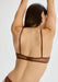 Back view of Blush The Mesh Sheer Wireless Bralette Cocoa showing adjustable straps and hook closure in breathable sheer mesh fabric.