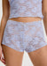 Soft Mesh Lace Shorts Blush Rosette Lavande boyshorts in sheer lilac floral lace with scalloped waistband, ideal for layering or intimate wear.