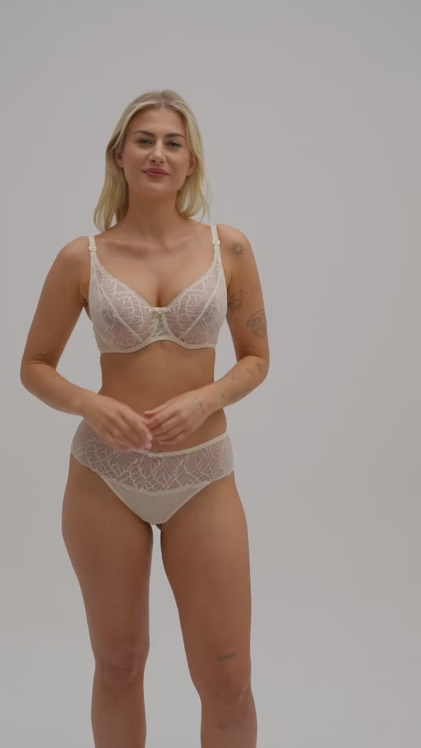 Model walking in Samanta Amelia sponge cake balconette bra and lace panty set, showcasing the bra’s supportive fit and elegant sheer design.