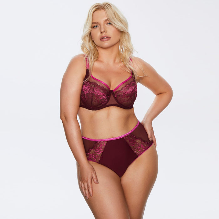 Model wearing Kinga Love Promise Soft Lace Panty and matching bra set in bordeaux with pink lace, showcasing coordinated lingerie look.